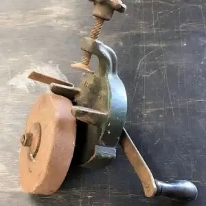 An old-fashioned hand tool that was easy to operate and widely used in the past