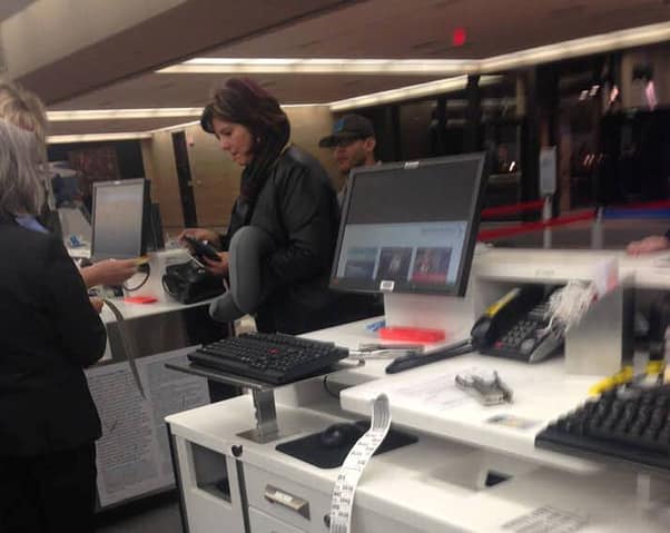 This image of a woman at an airport is gaining viral attention. Take a closer look, and you’ll understand why.
