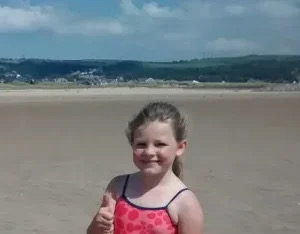 Dad Shares Innocent Photo Of His Son At Beach, Authorities Act Fast After Spotting Small Detail