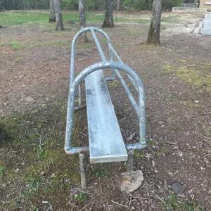 Strange “bench” with tubing near the parking lot of an old elementary school! Any idea?