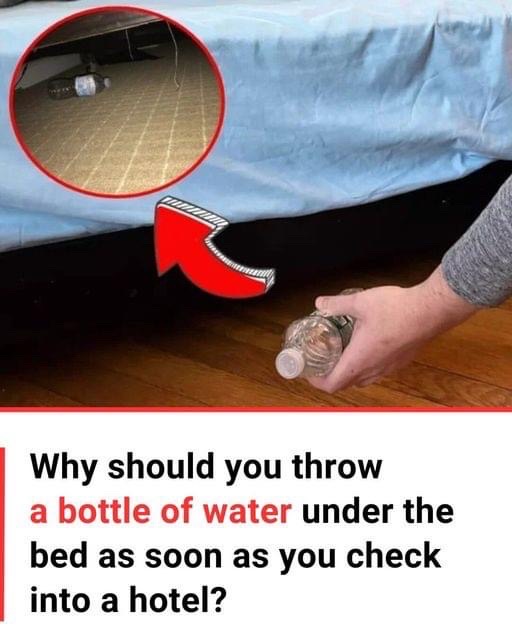 Why You Should Toss a Water Bottle Under Your Hotel Bed Right After You Check In