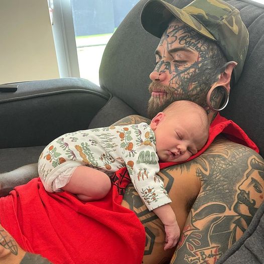 A 24-year-old father covered in tattoos decides to remove them for the sake of his child.