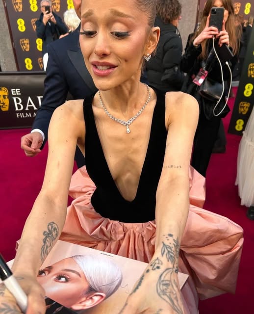 Ariana Grande signing fans pictures at the BAFTAโs