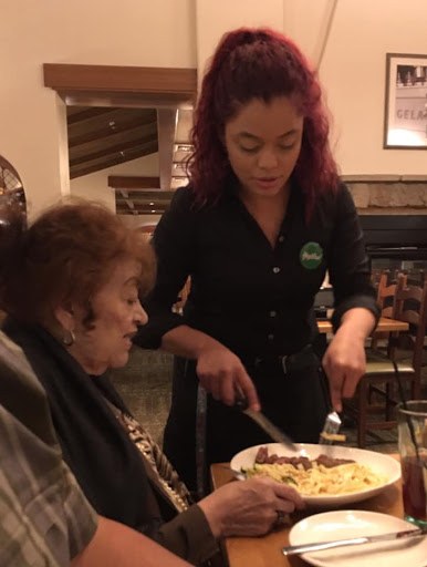 So last night we went to go eat at Olive Garden. My mother who is 79 years young decided to sit at the corner of the table where she felt more comfortable