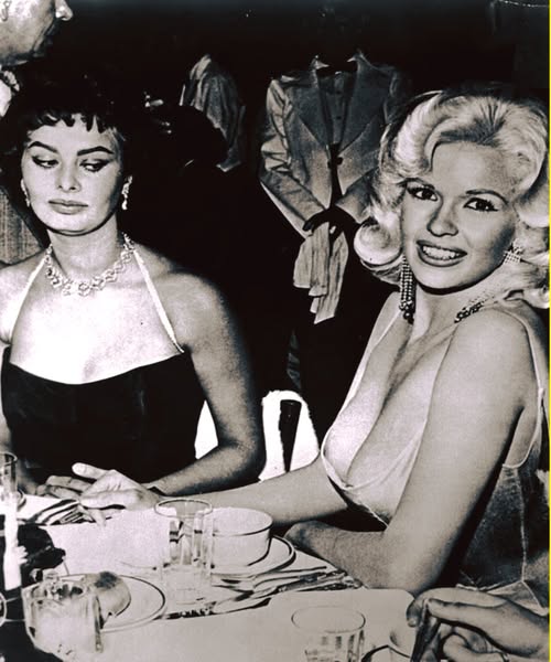 Kylie Jenner and Kourtney Kardashian revive a classic Hollywood moment by recreating an iconic photo for a glamorous new beauty campaign.
